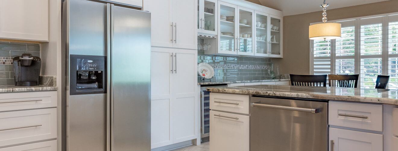 remodeled kitchen with Shaker cabinets and custom storage areas